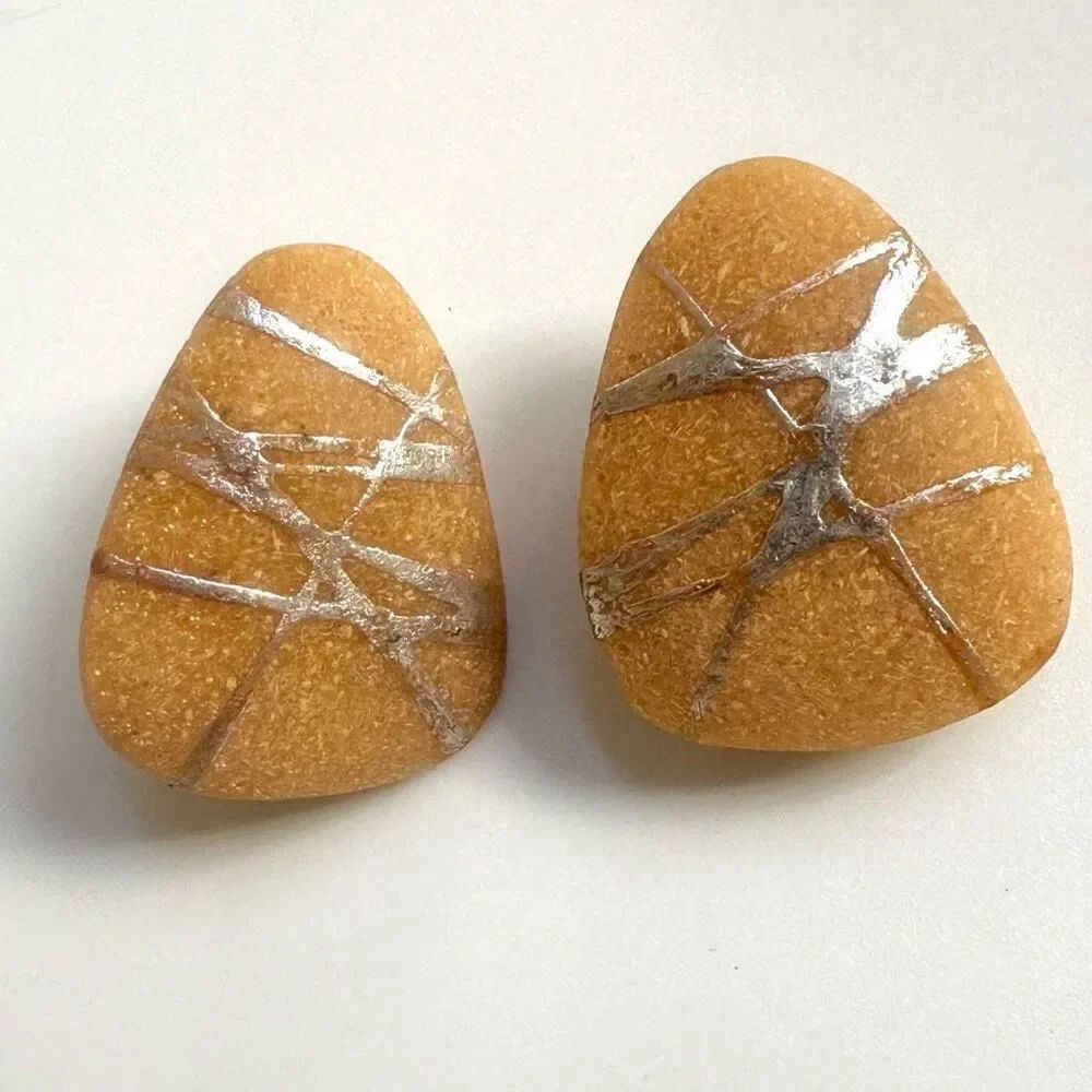 Tan and silver triangle clip on earrings